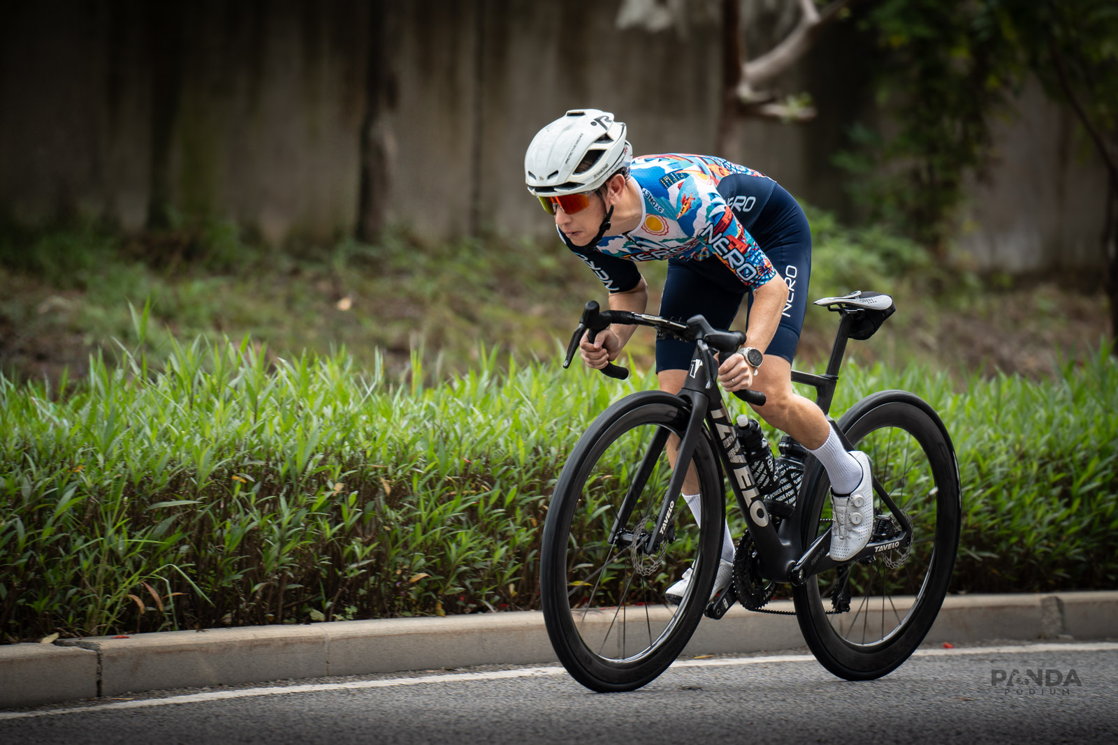 A rider sprinting on a bicycle
