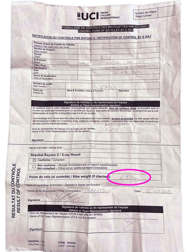 A certificate showing Harry's bike at 6.83kg